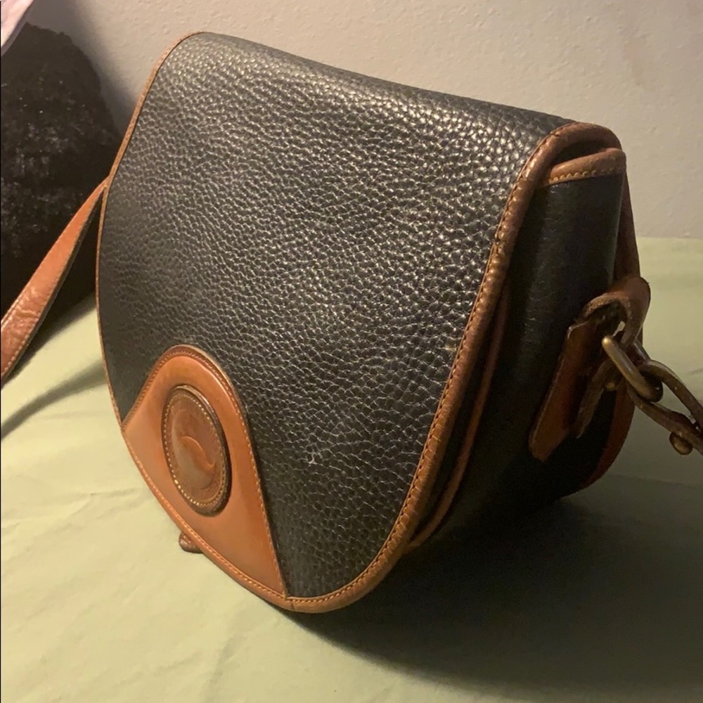 Genuine Dooney and Bourke all Weather Leather